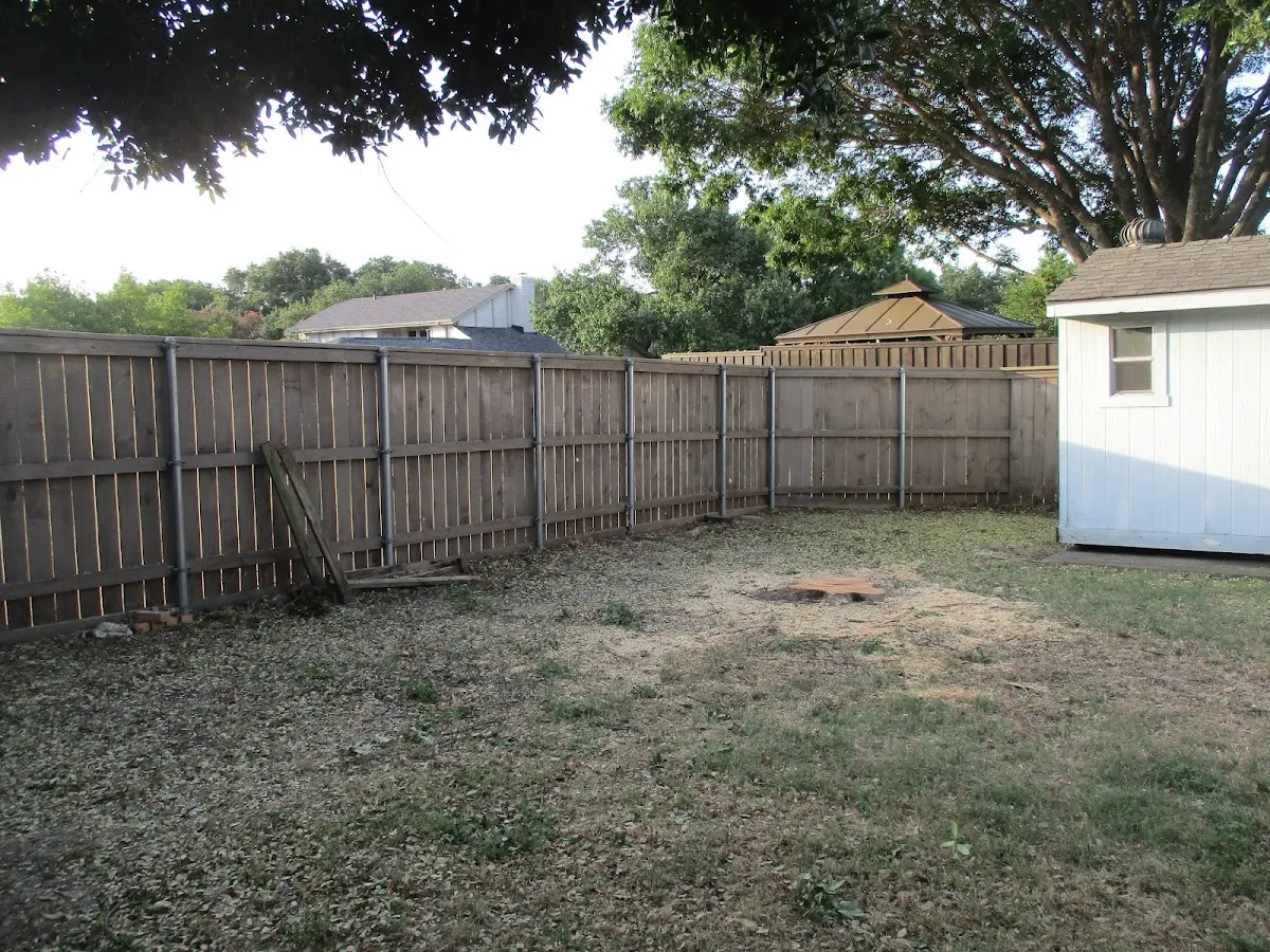 Cleared yard after professional tree removal in Hensel